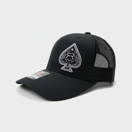 Black trucker cap with a logo on a white background